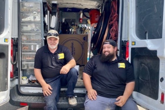 2 Mainstream Technicians Sitting in Truck