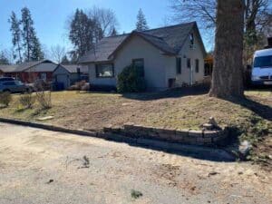 Completed sewer excavation and yard restoration in Coeur d'Alene home