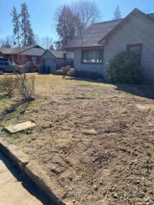 Finished exterior drain installation with clean grading in Coeur d'Alene