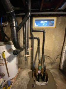 Updated drain piping connected to the home’s plumbing system, ensuring proper flow and reliable performance.