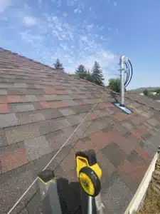 Roofline electrical mast and new service connection on a Spokane home