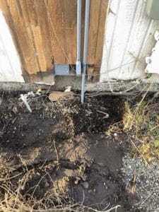 Electrical conduit installation and trenching at Spokane home exterior
