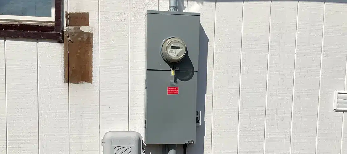 A newly installed electrical panel on the wall outside a home in Spokane, WA