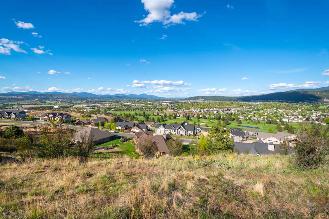 View of the cities of Liberty Lake, Spokane Valley, Otis Orchards and Post Falls from a hilltop in Liberty Lake, Washington, USA.