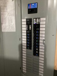 Updated electrical panel with labeled circuit breakers in Spokane home